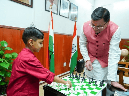 Youngest chess player Tejas Tiwari met CM Dhami