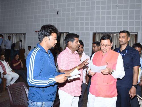 A large number of people from different areas of the state met CM Dhami