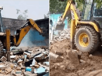 Bulldozer runs on illegal houses built on the side of the highway