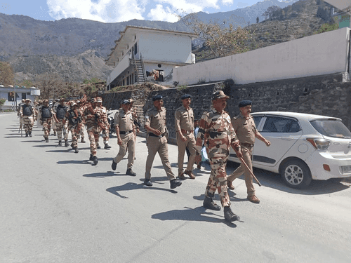 Chamoli Police and ITBP personnel took out flag march