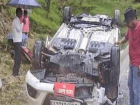 A government vehicle overturned in the middle of the road