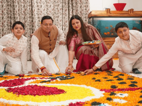 CM Dhami lit the lamps with his family