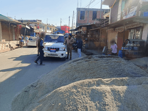 The road was blocked by dumping sand on the road, action taken by Pithoragarh Police