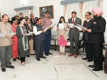 Governor Gurmit Singh administered oath to officers/employees on Constitution Day