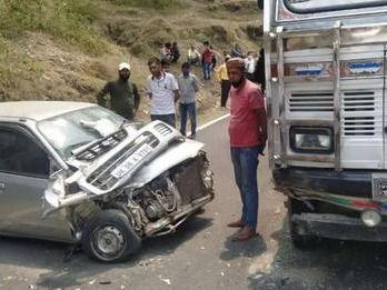 Two people were injured in a car-truck collision