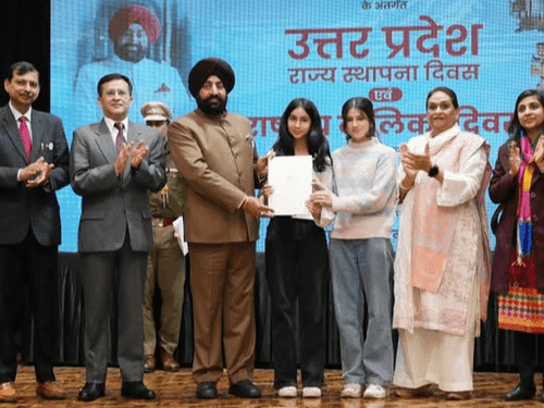 Governor Gurmit Singh honored the girls who scored the highest marks