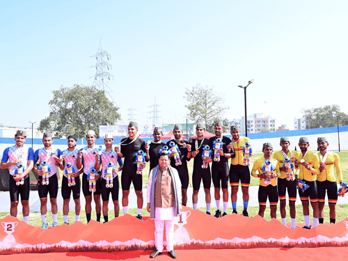 Image for CM Dhami honored the cycling medal winners by wearing medals