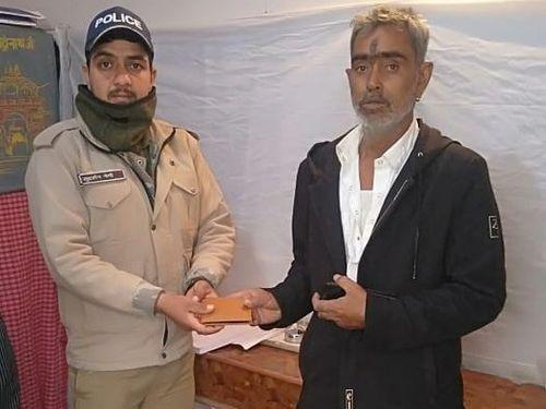Friend police recovered the lost purse and successfully handed it to the owner