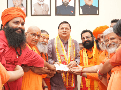 Akhada Parishad meets CM Dhami, contributes ₹34 lakh to Relief Fund