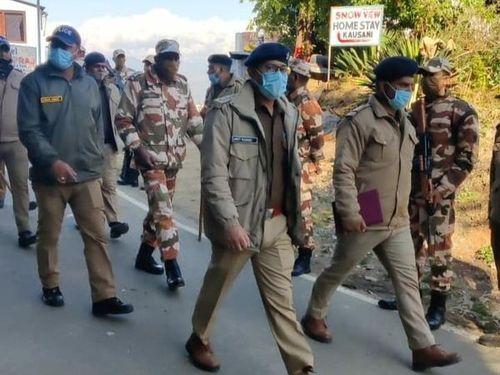 Flag march was conducted by police and paramilitary force soldiers in police station Baijnath and Kausani area in view of the upcoming assembly general election.