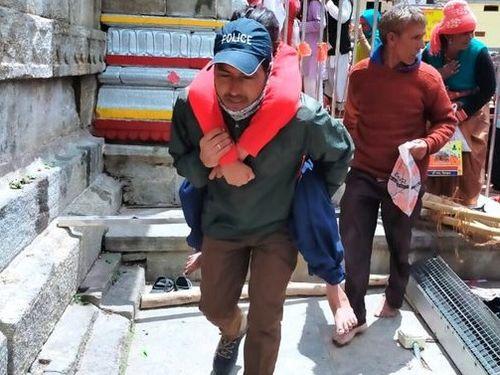 Temple visit to a disabled woman