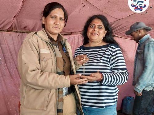 After finding the lost gold chain of the devotee, the police handed it over to its owner