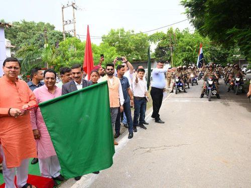 CM Dhami flags off 150 Cheetah mobile bikes