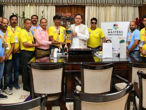 CM Dhami honored the medal-winning football players