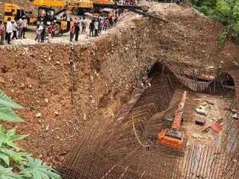 Many laborers were trapped after the setting of the bridge under construction on Badrinath Highway collapsed.