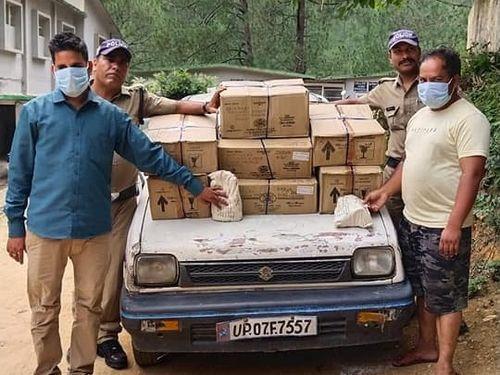 Two accused arrested with 7 boxes of illigel liquor