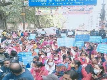 Cleaners sitting on Dharna