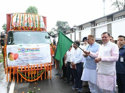 CM Dhami flagged off the first consignment of mango, honey, and Rajma being sent for export to the international market.