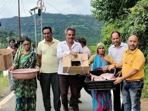 Distribution of one-day poultry birds to 50 scheduled caste beneficiaries