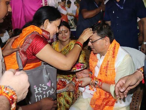 CM Dhami participated in the Rakshabandhan Milan program organized in Khatima