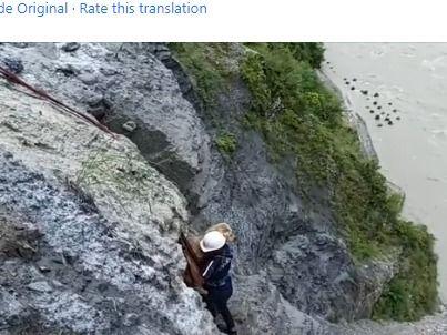 Fire service personnel rescued the dog trapped on the hill