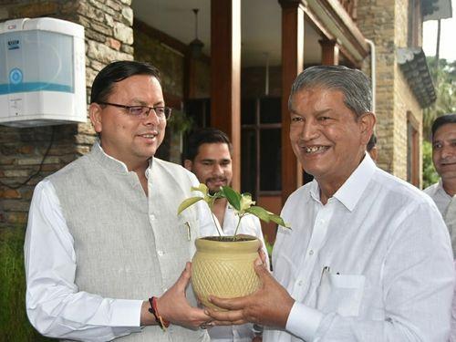 Former CM Harish Rawat made a courtesy call on CM Dhami