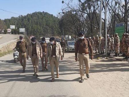 A flag march was conducted in Baijnath and Garud area with the police and paramilitary personnel.