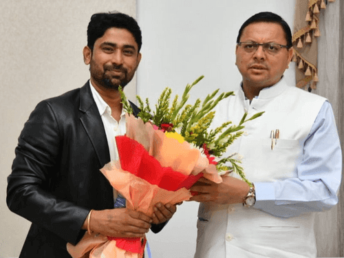 Manmohan Tiwari paid a courtesy visit to CM Dhami