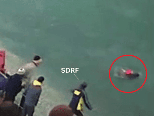 Devotee woman started flowing in the river, rescue done by SDRF Team