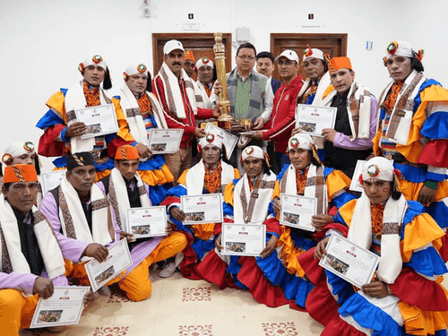 Artistes of 'Manaskhand' tableau of Uttarakhand met CM Dhami