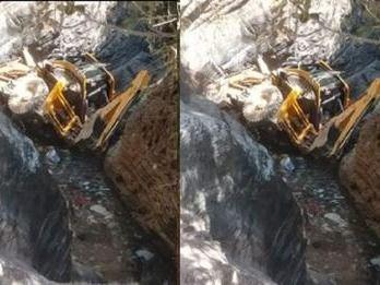 JCB fell in a ditch during road construction
