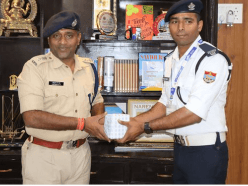 Honored for helping a woman injured in an accident