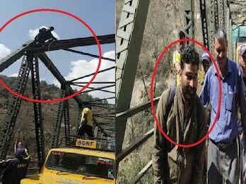 Youth climbed over the bridge, threatened to jump