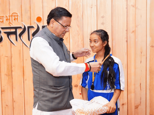 Players participating in kick boxing competition met CM Dhami