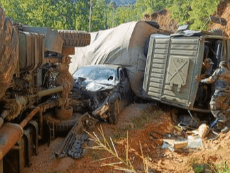 Three army trucks crashed here one after the other