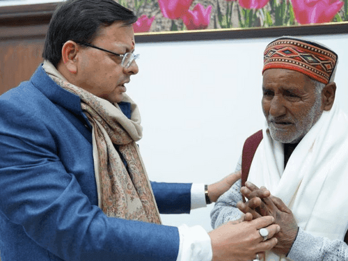 Mr. Radheshyam Kanswal, father of mountaineer late Savita Kanswal, met CM Dhami