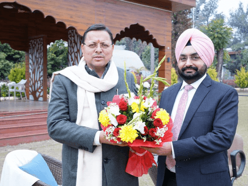 Dr. S.S. Sandhu met CM Dhami on completion of his tenure