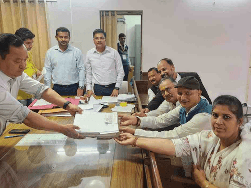 Congress candidate Virendra Rawat filled the nomination form