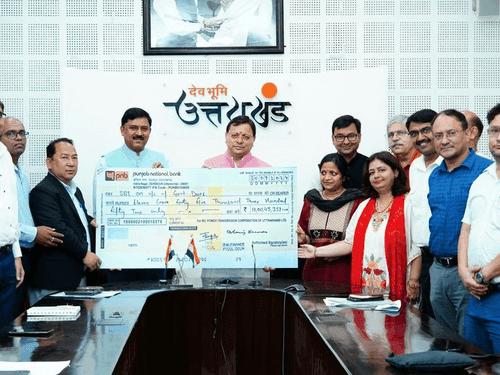 Managing Director Pitkul handed over a dividend cheque of Rs 11 crore to CM Dhami