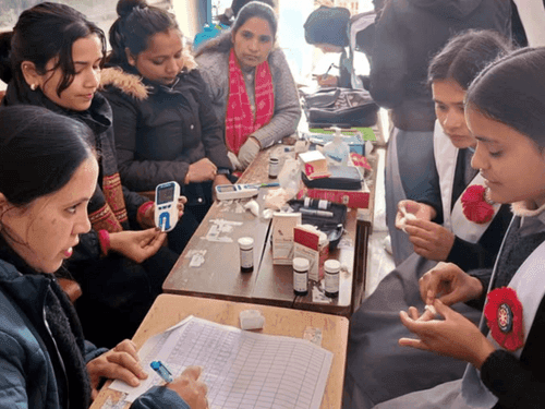 Hemoglobin test of girl students is being done by organizing camps