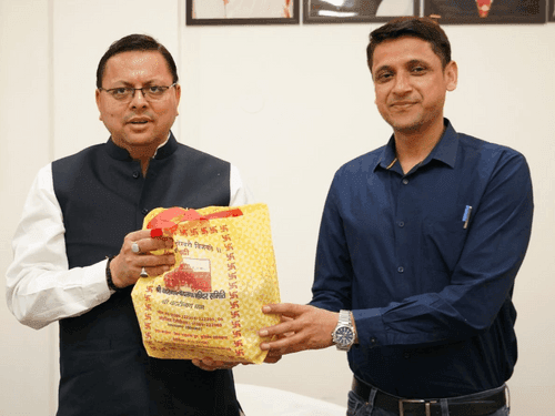 Officials met CM Dhami at Chief Minister's residence