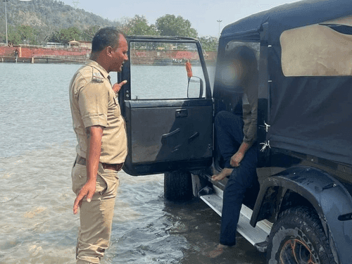 Action taken against the person who created a ruckus by landing the vehicle in the Ganga