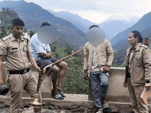Action taken against 04 youths smoking hookah in public place
